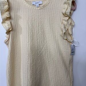 CeCe Cream Textured Ruffle Sleeve Sleeveless Top